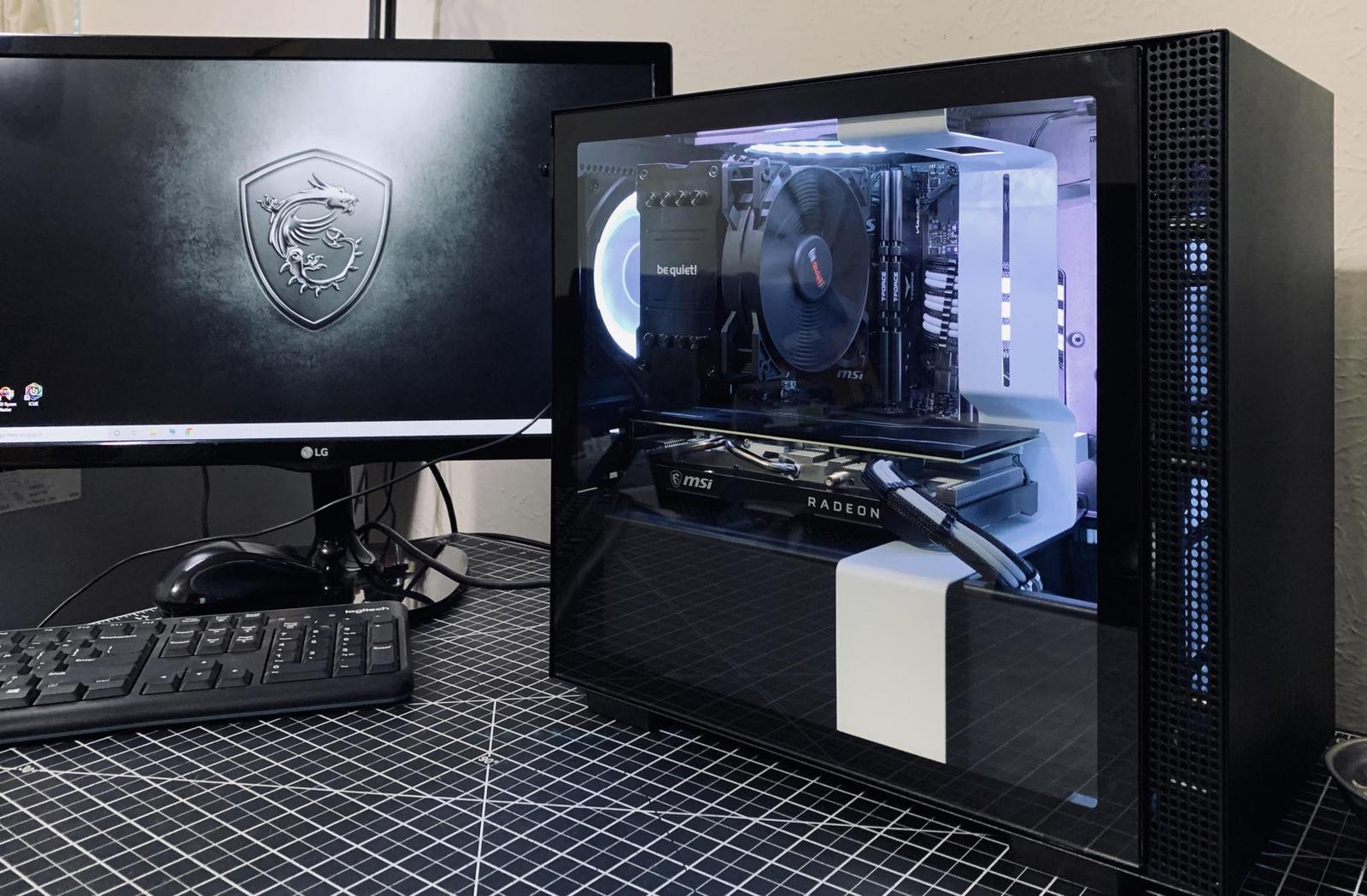 Clean black and white build in an NZXT ITX case by grimmwrath 